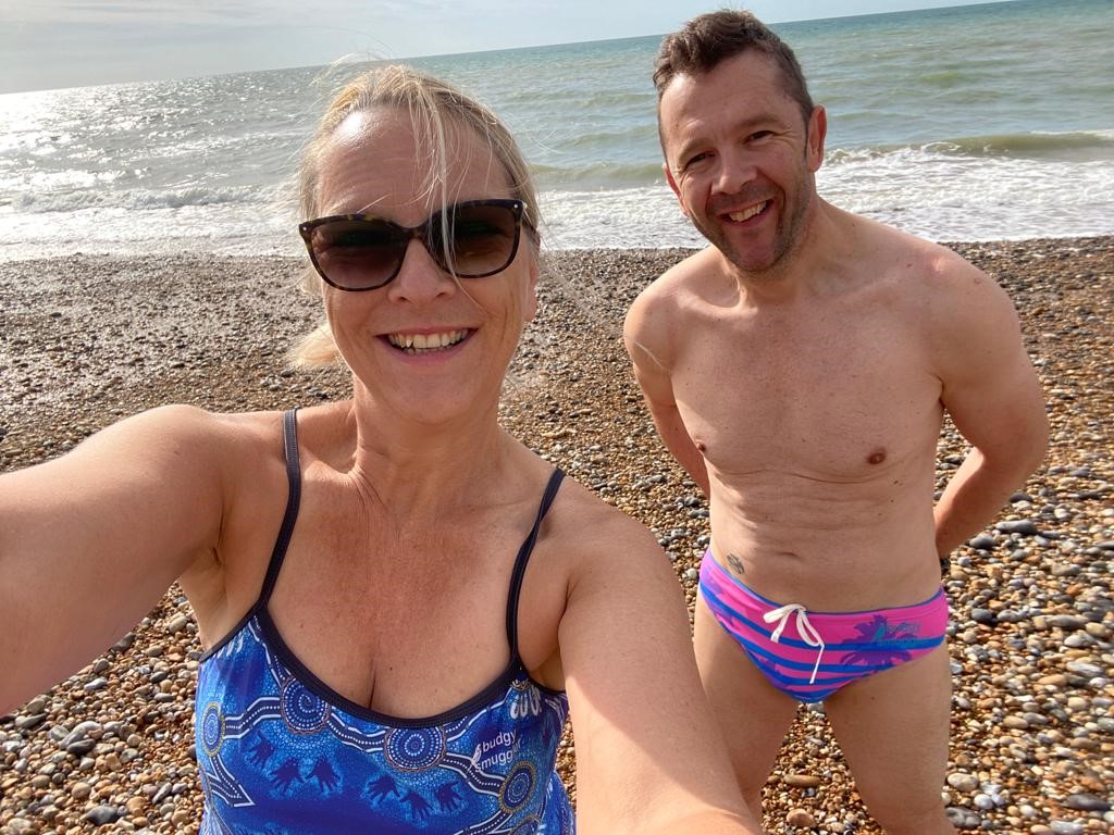On the beach with Gareth in swimwear